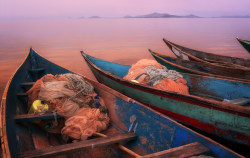 souls-of-my-shoes:   	Colorful fishing boats on Lake Victoria, Kenya by Dietmar Temps    	Via Flickr: 	Colorful fishing boats at sunset on Lake Victoria, Mfangano Island, Kenya  