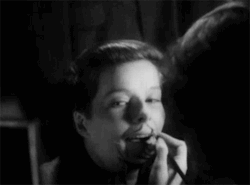 sqbr:  [Katherine Hepburn with swept back hair drawing on a fake moustache then admiring herself manfully in a mirror] wehadfacesthen:  Katharine Hepburn in Sylvia Scarlett  (George Cukor, 1935), a colossal flop at the time because of its themes of sexual