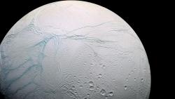 mbhk14:   A stunning high res photo of Saturn’s Moon Enceladus  Btw, there’s evidence to support that Enceladus has an ocean beneath the icy surface making it one of the more likely sites in our solar system to have microbial life. It’s also active