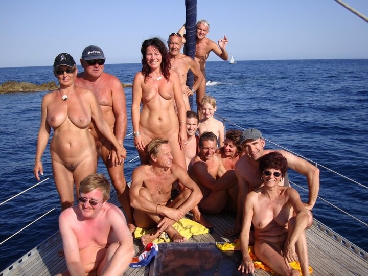 Nudist family sailing