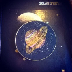 enidtwigletembroidery:  Hand embroidered Saturn with glow in the dark stars in vintage metal hoop 