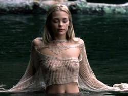 starprivate:  Jaime King is topless in the water  Jaime King fishing with her seethrough topless fishnet. Ain’t easy.