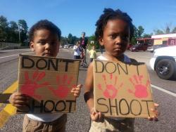 micdotcom:  This may be the saddest photo from Ferguson yet. (via @hystericalblkns, ht motherjones)  