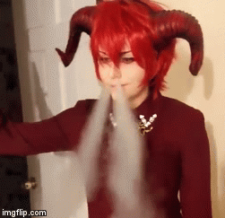 kobrakid23:  Smol, fire-breathing brat.  Halloween night XD I loved this costume so much, we had a lot of fun  dorking around and bein spoopy! (PSA. I’m using a non-niccotine  non-substance vaporizer, it’s nothing naughty XD) 