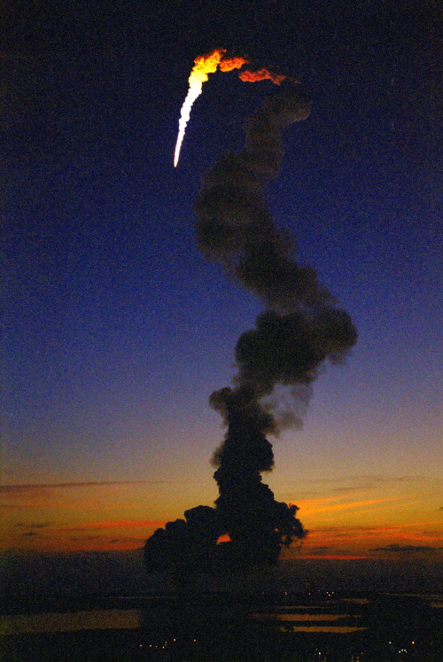 humanoidhistory:  May 19, 2000: The Space Shuttle Atlantis lights up the early morning sky over Cape Canaveral.