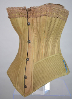 symingtoncorsets:  c1890. Busk front corset made from cotton twill lined in fawn coutil and interlined with hessian. This corset is a Symington speciality and is called ‘The Pretty Housemaid’ and is advertised as the strongest and cheapest corset