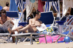 toplessbeachcelebs:  Asia Argento (Actress) sunbathing topless in Sabaudia (June 2005) 