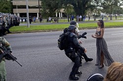 nevaehtyler:  This is Leshia Evans. She’s a 28-year-old nurse assistant and mother to a 5-year-old son. She was attending her first protest in Baton Rouge. She was arrested and held for 24 hours. 