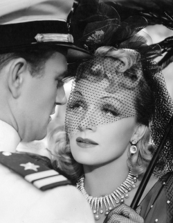 divadietrich:  Marlene Dietrich and John Wayne in “Seven Sinners (1940). 