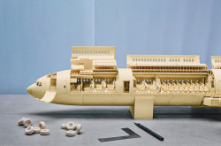 mymodernmet:  Boeing 777 by Luca Iacoi-Stewart An extremely detailed model of a Boeing 777 made of manila folders.