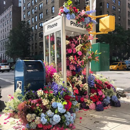 itscolossal:Sprawling Floral Installations Spill Over Garbage Cans and Phone Booths on New York City Streets