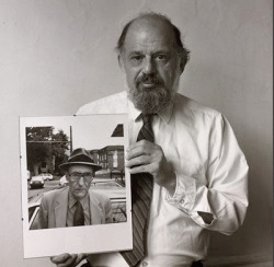 pattismithandrobertmapplethorpe:  Allen Ginsberg with the portrait of William Burroughs he shot, Photo by Fred W. Mcdarrah
