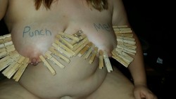 slavegirlrl:  Request: can you post a picture with “punch me” written on your tits cunt?   I added the clothes pins for a little extra fun ;)