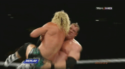 Kane copping a feel, and giving Dolph a nice wedgie! Shame he was wearing underwear