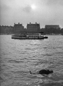 Alfred Hitchcock (or rather, a dummy of Hitchcock) floating down the River Thames, (Frenzy, 1972). 