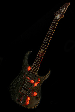 tipsygypsyadventures:  amplifiedparts:  The Molten Diabolic Ibanez Prestige created by Hutchinson Guitars. This is absolutely fantastic!!! &lt;3 “Celebrating the release of ‘Diablo III’ earlier this year, the Molten Diabolic draws its namesake from