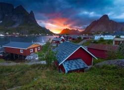 wanderlustav:Robuer in Norway. Robuer are red fishing houses in the Lofoten region of Norway.
