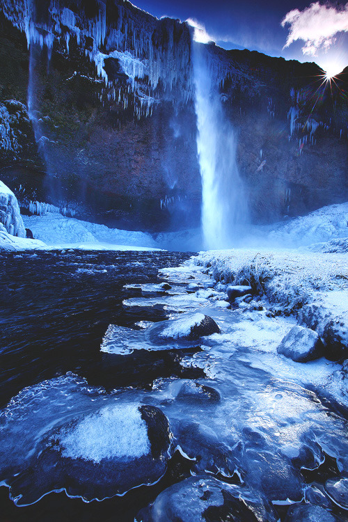 lsleofskye:  A partly-frozen Seljalandsfoss, the stunning waterfall that greets travellers along Iceland's epic south coast | James AppletonLocation: Seljalandsfoss, Iceland