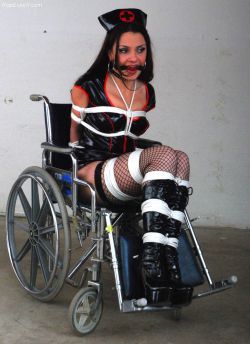 graybandanna:  Evil nurse tied to a wheelchair 