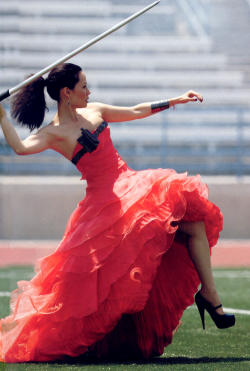lexandem:  crossbowsandwalkers:  Is this Lucy Liu throwing a javelin in a dress and high heels   