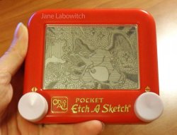 dorkly:  Etch-a-Sketch Charizard Something tells me Earthquake would be super effective against this one.  I only did lines in that god awful toy. 1 of my worst gifts ever.