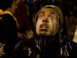 diffakult:  unrar:  A protester pours milk in his eyes after being tear gassed by Seattle police at the Interstate 5 entrance on Cherry Street in Seattle, Monday, Nov. 24, 2014. Protesters took to the streets in response to the Ferguson, Mo., grand jury