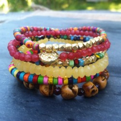 goodcharma:  #CustomCharma inspired by tribal beads… Loving the color combinations and the wood skull strand. ❤️