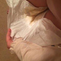 diaperedmilf:  All wet this morning  Gave daddy a good one to change hehe