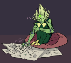 deadwooddross:  In which Peridot sits in her doggie bed and is fascinated by crinkly newspapers 