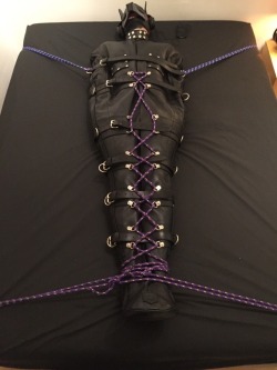 feelingknottycda:The rambunctious @hushpuppy1980 wanted a turn into my new sleepsack. But he kept wriggling about, so I had to add more ropes to make sure he wouldn’t fall off he bed. Not sure that I have enough yet, though.