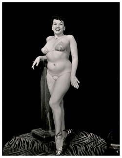 Suzette           aka. “The French Doll”..Appearing in a publicity still promoting the 1953 burlesque film: “PEEK A BOO”; a documentary-style recording of a complete Burlesk show; filmed at Los Angeles’ ‘FOLLIES Theatre’..