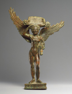theancientwayoflife:  ~ Patera Handle in the Form of a Nude Winged Girl. Culture: Etruscan Place of origin: Etruria Date: second half of 4th century B.C. Medium: Bronze