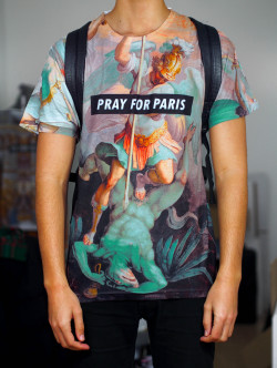 steezleo:  check out Pray for Paris shirts worldwide shiping  http://www.prayforparis.com/ 