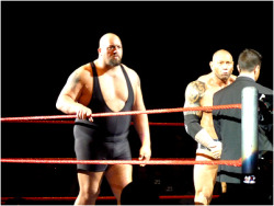 rwfan11:  BIG BULLIES! Big Show and Batista bullying the ring announcer 