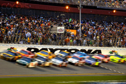the-nascar-rollback:  The green flag waves to restart the NASCAR Sprint Cup Series Daytona 500 at Daytona International Speedway, Daytona Beach, Florida on February 15, 2009.