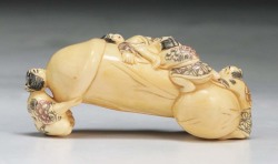 erotic-art-history: Today’s piece of historic erotic art is a piece of netsuke that comes to us from 19th century Japan. (1)  Netsuke was originally an ornate hand carved button-like object made from ivory or wood to fasten a pouch to carry personal