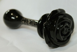 sluttybbw:  preciousblackpearl:submissivefeminist:  kittensplaypenshop:  Adding a very pretty glass rose plug. It’s all one solid piece of hand blown glass. :)  WANT!  Daddy! I want this!🐯👑😳  Ooooh I want one!!!!
