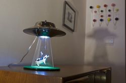 Alien Abduction light - UFO lamp, conceived by Lasse Klein is a unique lighting unit which is shaped like an alien saucer or a UFO.