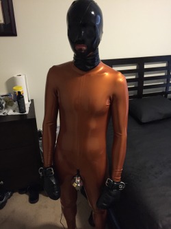 schwarzgummi:  rbrlover: The copper suit claimed another boy. He was spread eagled, locked in chastity, plugged with the electro plug and later on hogtied Sehr schön!
