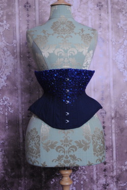 beneaththetower:  The Midnight Underbust, navy blue corset encrusted with hundreds of sequins, seed beads and bugles in shades of dark blue.  Inspired by the midnight sky.