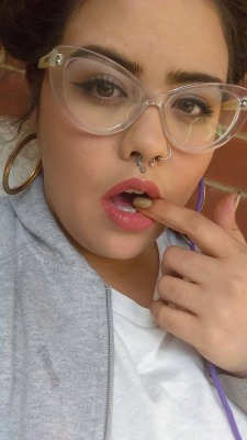Milkyangel in clear frames and pink lipstick