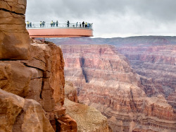 natgeotravel:  The skywalk is the only place to see the Grand Canyon through a glass-bottomed balcony suspended 4,000 feet over the canyon floor. Float above the land in today’s Travel 365. Photograph by Chris Maluszynski, Moment/Redux 