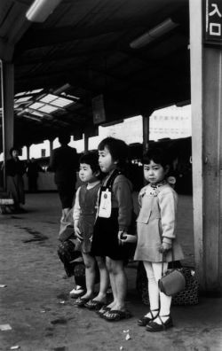 2000-lightyearsfromhome: Japanese sisters at the station - Tokyo. Japan - April, 1954   ©  Robert Capa  https://painted-face.com/