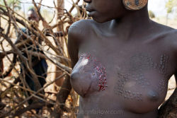   Ethiopia’s Omo Valley, by Olson and Farlow  Women in this valley have heavy scarification to make themselves more “beautiful.” Because it is so painful, young women only have one breast scarified at a time.  Each village has one woman that does
