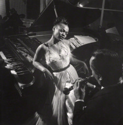 twixnmix:   Eartha Kitt and   orchestra  leader Frank Weir at Churchill’s Club in London, 1951.   Photos by Russell Westwood     