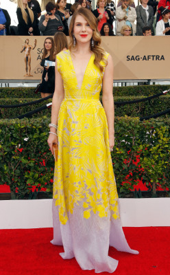 omgthatdress:  Lily Rabe looks like a ray of pure sunshine!  There’s always yellow dresses at awards shows, I love seeing something unique with it!