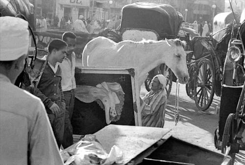 Frank Horvat,  Street scene with painting, Cairo, Egypt, 1962. Nudes &amp; Noises  
