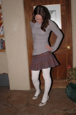 mikeysag:  sissifiedcourtney:  Sexy schoolgirl shemale stripping in front of her house so naughty…  I lover her plaid skirt, her tiny perky hormone induced breasts and her big clit…..  So sexy