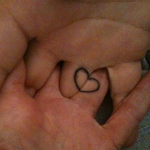 Couple matching heart and key tattoo