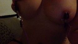 s-blackandwhitelies:  Currently have an obsession with my tits and chains….they just look so fun with clamps on. And a sharp tug while I’m playing just makes me cum that much harder
